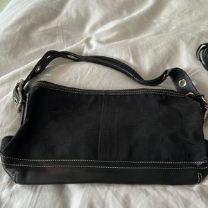 Authentic Black leather Coach monogram shoulder bag.